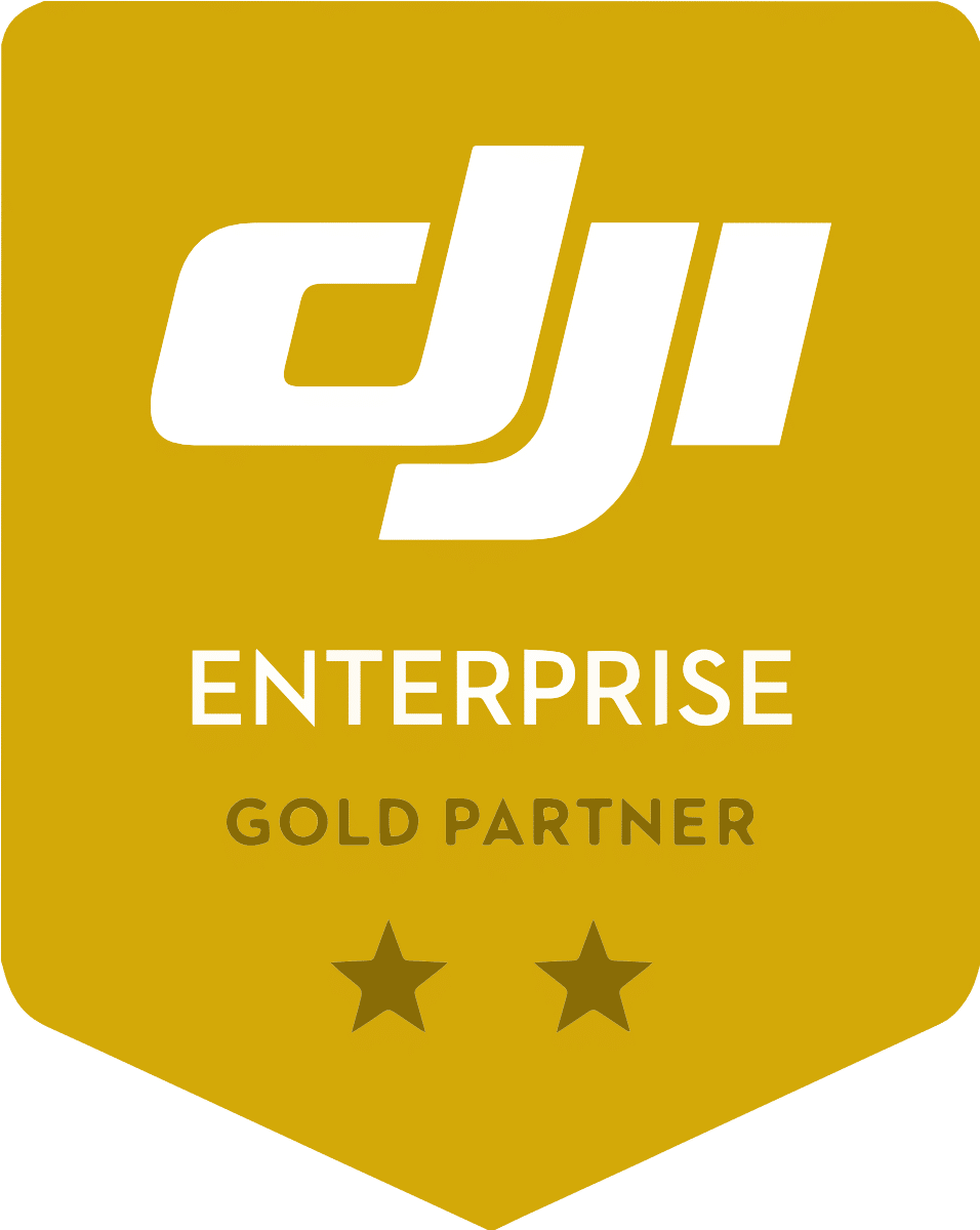 Ein goldfarbenes Logo von DJI Enterprise. Der Text "DJI Enterprise" ist in weiß gehalten. Darunter steht in einem dunklen Goldton "GOLD PARTNER". Unterhalb des Textes sind im selben dunklen Farbton zwei Sterne abgebildet.